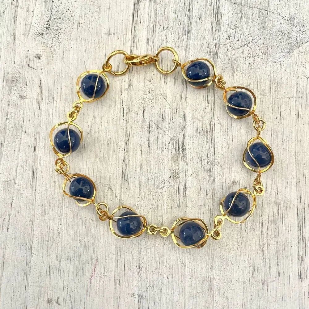 Gold tone blue beaded bracelet